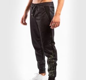 Pantalons en jersey de coton confortable en molleton OEM, pantalons de jogging légers pour hommes, pantalons de survêtement décontractés et fins avec poches zippées - Product Image 1