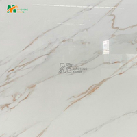 Dalle de pierre frittée blanche MT Stone avec fines veines orange pour comptoir de cuisine et carrelage mural