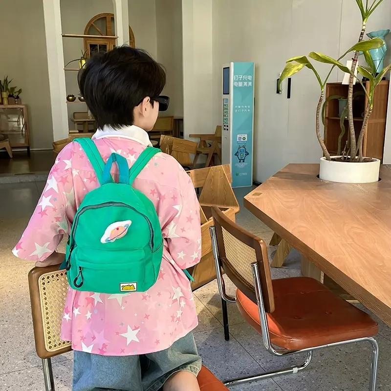 Anaokulu bebek sırt çantası sevimli kız Macaron renk yeni erkek ve çocuk Schoolbag basit batı tarzı
