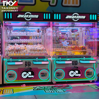 Machine à griffes double poste avec grand espace de rangement, design adapté aux enfants pour la distribution interactive de jouets mystères