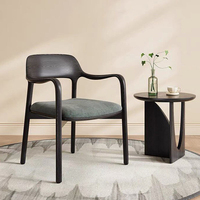 Fauteuil en bois néo-chinois avec dossier courbé monobloc, assise rembourrée douce, finition noyer noir pour la maison et l'hôtel