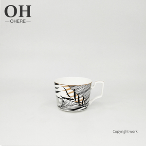 Juego <span class=keywords><strong>de</strong></span> tazas <span class=keywords><strong>de</strong></span> café y platillos <span class=keywords><strong>de</strong></span> lujo <span class=keywords><strong>de</strong></span> alta gama, hojas negras y doradas para vajilla <span class=keywords><strong>de</strong></span> boda, novedad <span class=keywords><strong>de</strong></span> <span class=keywords><strong>2022</strong></span> - Product Image 5