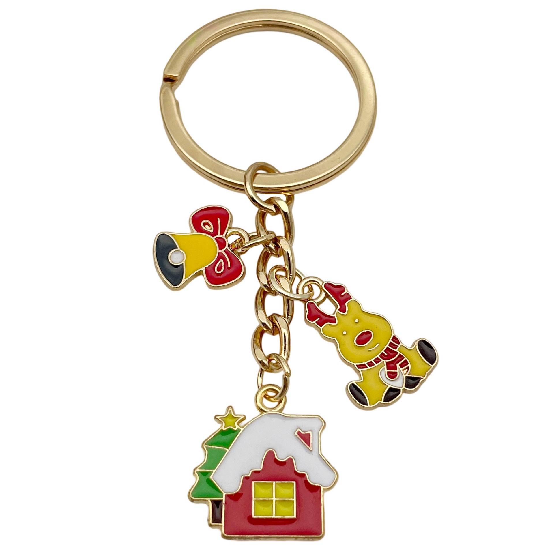 Porte-clés de Noël rouge avec maisonnette enneigée, élan et clochette.