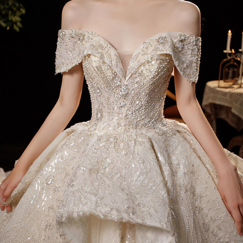 Robe de couleur champagne longueur au sol (comprend 4m voile uni + agitation)