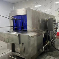 Machine à laver les plateaux et caisses alimentaires de luxe en acier inoxydable avec pompe à moteur et contrôle automatique, dotée de la stérilisation