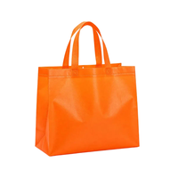 Sac à vêtements en non-tissé laminé avec sangle renforcée, logo personnalisé, emballage lourd pour vêtements