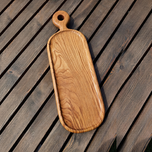 Planche à découper ovale en teck massif avec poignée surélevée - Product Image 1