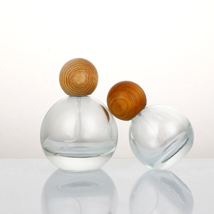 Flacon de parfum rond en verre, mini flacon échantillon, flacon pulvérisateur à pression, flacon de parfum portable rechargeable, récipient cosmétique - Product Image 1