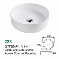 Lavabo en céramique rond à profil bas moderne de 120 mm de hauteur avec drain pour usage hôtelier, à poser sur comptoir ou à fixer au mur