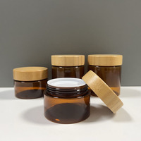 Emballage cosmétique Pot de miel de qualité alimentaire 100ml 250ml Pot de crème en plastique pour animaux de compagnie avec couvercle en bambou véritable