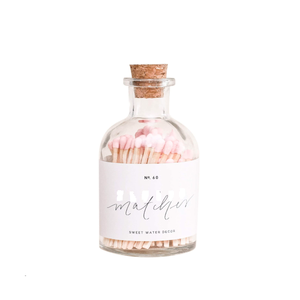 Small glass bottle matches in glass jar matchsticks