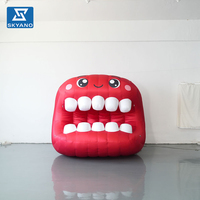 Modèle gonflable personnalisé de lèvres et de dents rouges de dessin animé pour la décoration d'événements de maquillage et d'expositions dentaires