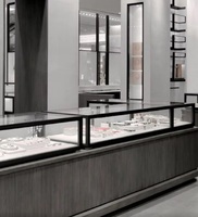 Vitrine à bijoux en verre sur mesure haut de gamme GZowin avec éclairage LED, cadre en métal noir moderne, design personnalisable pour les magasins de détail