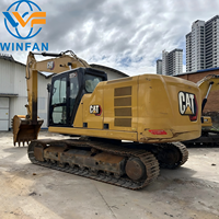 Excavatrice sur chenilles Caterpillar 323GC d'occasion de taille moyenne avec cabine d'origine