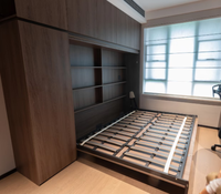 Lit Murphy moderne multifonctionnel en acier avec armoire intégrée et bureau, offrant un grand espace de rangement pour les espaces de vie compacts