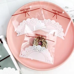 100pcs sac à biscuits transparent à nœud frais - Product Image 1