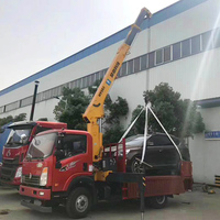 Grue télescopique HAOY 5 tonnes télécommandée pour éclairage public montée sur camion