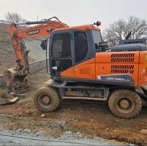 รถขุดล้อยี่ห้อ Doosan รุ่น DX140W มือสอง น้ำหนัก 14 ตัน รถขุดล้อแท้จาก Doosan ชั่วโมงการทำงานต่ำ ขาย - Product Image 3