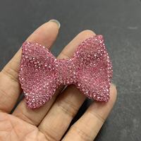 En gros, breloques de luxe scintillantes avec motifs nœud, signe du dollar, rose, rouge, bleu, noir, argenté, pour coques de téléphone, coques d'iPad, style Kawaii et artisanat DIY