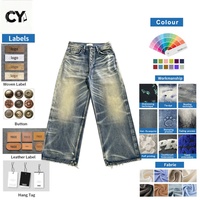 Fabricant en gros OEM ODM – Jeans amples pour hommes, style vintage, bleu teinté, coupe baggy, denim délavé, ourlet brut, fermeture boutonnée
