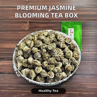 Thé vert au jasmin, thé aux fleurs écloseuses, emballage en boîte, spécialité santé