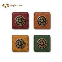 Étiquette en cuir personnalisée Jinyi, cousue carrée, pour vêtements hijab et abaya, accessoires de couture, avec logo métallique, fabrication OEM ODM