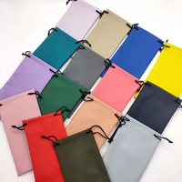 Vente en gros Pochette à lunettes en PU de qualité supérieure colorée Sac d'emballage souple pour lunettes de soleil Sac à cordon souple avec logo personnalisé pour lunettes de soleil