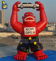 Logo personnalisé Énorme gorille gonflable tenant une voiture Grand gorille gonflable pour la publicité