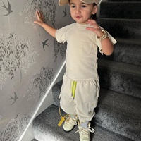 Ensemble de vêtements pour bébés garçons de haute qualité avec logo de marque personnalisé, t-shirt uni et pantalon cargo, vêtements d'été pour enfants