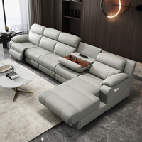 Canapé d'angle modulable en cuir de luxe moderne à trois places avec fonction massage et rafraîchissement, structure métallique pliable pour salon