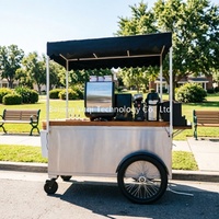 Chariot à panneaux en acier et bois pour marchés fermiers, festivals et vente ambulante, conception mobile avec roues, idéal pour le café