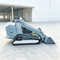 Chargeuse compacte équipée d'un système hydraulique à triple cylindre et double flux pour les travaux d'aménagement paysager, le déneigement et le chargement