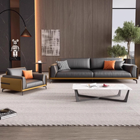 Canapé de bureau modulable trois places en cuir véritable moderne, combinaison table basse pour appartement commercial