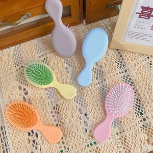 Cepillo de masaje para el cabello con mango ovalado de plástico para aliviar el cuero cabelludo, diseño portátil y bonito - Product Image 3