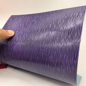 กระดาษหนังเรซิ่นเคลือบเงา UV ลายคลาสสิกแบบ Saffiano ผิวเรียบเนียน สำหรับทำกระเป๋า กล่อง แว่นตา แหวน หรูหรา - Product Image 1