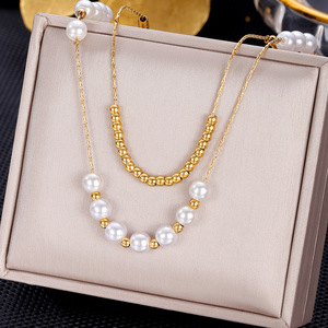 Collier ras du cou tendance pour femme en acier inoxydable plaqué or 18 carats avec pendentif cœur en perles et zircon, style émeraude, vente en gros - Product Image 5