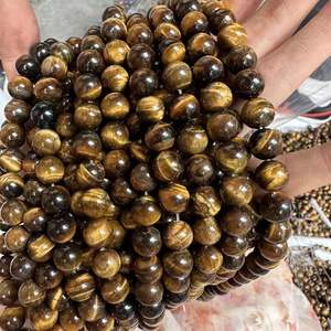 Vente en gros de <span class=keywords><strong>pierre</strong></span> naturelle 4/6/8mm Agate Oeil de tigre rouge perles rondes en vrac semi-finies Bracelet à bricoler soi-même Accessoires de bijouterie - Product Image 1