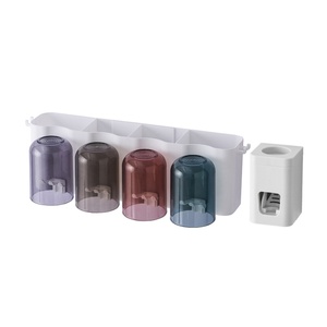 Toothpaste Dispenser with <b>Wall</b> <b>Mounted</b> <b>Toothbrush</b> <b>Holder</b> Kids Hands Free Toothpaste Squeezer Set - Product Image 1