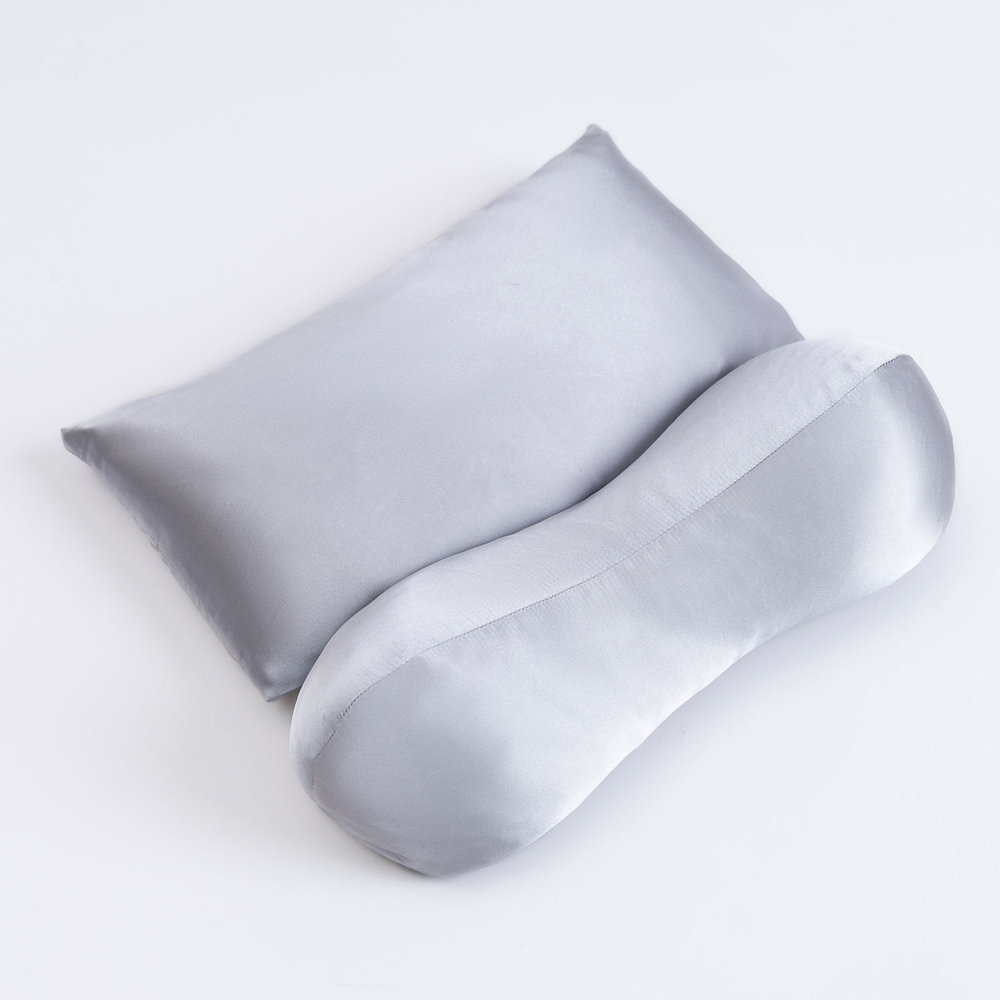 หมอนผ้าไหมสีเทาอ่อนสำหรับดึงคอ