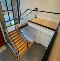 Rampe d'escalier en verre à montage latéral avec balustrade en verre à canal en U intégré
