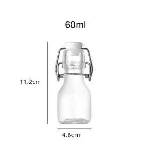 Bouteilles de shot de gingembre en verre réutilisables de 60 ml (2 oz) avec logo personnalisé, petits contenants hermétiques pour shots sains, avec bouchons pivotants hermétiques - Product Image 4
