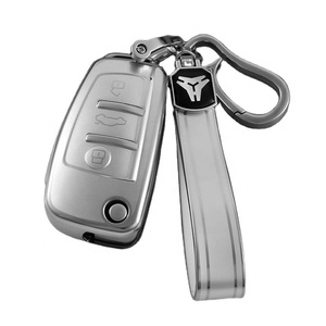 Housse de clé de voiture Quicksand TPU avec <span class=keywords><strong>porte</strong></span>-clés pour <span class=keywords><strong>Audi</strong></span> A1 A3 A4 Allroad A5 A6 Q3 Q5 Q7 R8 <span class=keywords><strong>RS</strong></span> RS7 S3 S4 S7 SQ5 TT protecteur de clé de voiture - Product Image 1