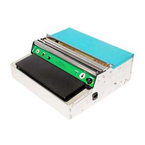 Machine d'emballage alimentaire compacte pour film étirable PVC, légumes et fruits, avec fonction manuelle, pour l'emballage de produits alimentaires et de fruits. - Product Image 1