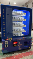 Distributeur automatique miniature mural en métal à pièces et billets avec interface en anglais pour un usage de divertissement