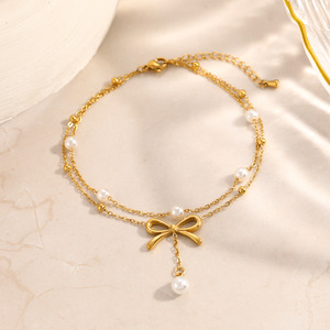Nouvelle collection de bijoux d'été : Bracelet de cheville double couche en acier inoxydable plaqué or PVD, avec breloque perle délicate et nœud, étanche, vente en gros - Product Image 2