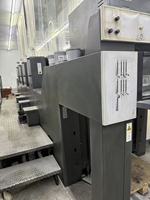 Un ensemble de presses offset quadricolores HEIDELBERG d'occasion, de taille quart, fabriquées en 2007. SM74-4H