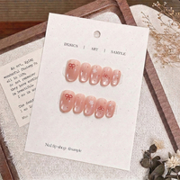 Pointes d'ongles Macaron Pailletées Nacrées Effet Feu d'Artifice Étoilé 10 pièces Courtes Rondes Peintes à la Main Design Personnalisé Faible MOQ
