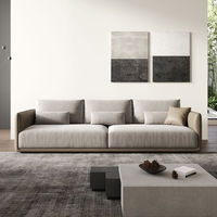 Ensemble de canapés modulaires carrés minimalistes en tissu et cuir color-block de qualité professionnelle pour projets commerciaux de hall d'hôtel