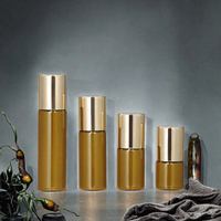 Flacon cosmétique de luxe en verre ambré de 5 ml pour mini-attar d'oud, sérum de soin, avec roll-on doré et diffuseur à bâtonnets