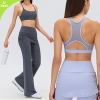 Soutien-gorge de sport pour femme, dos nageur, avec coussinets semi-fixés, décolleté en U, découpes en maille, absorption des chocs, pour yoga et gym, style crop top